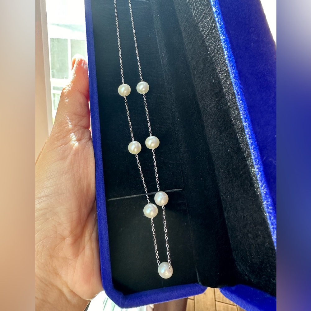 Like new real fresh water pearls on 925 silver chain (18 in)